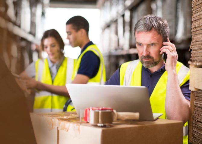 people working at a warehouse