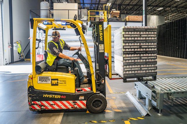 A dock worker moving items